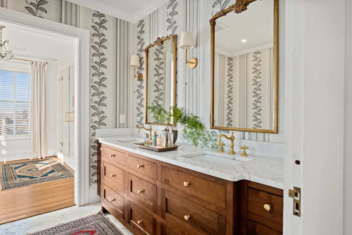 Elegant bathroom with custom cabinetry and coordinated design Massachusetts