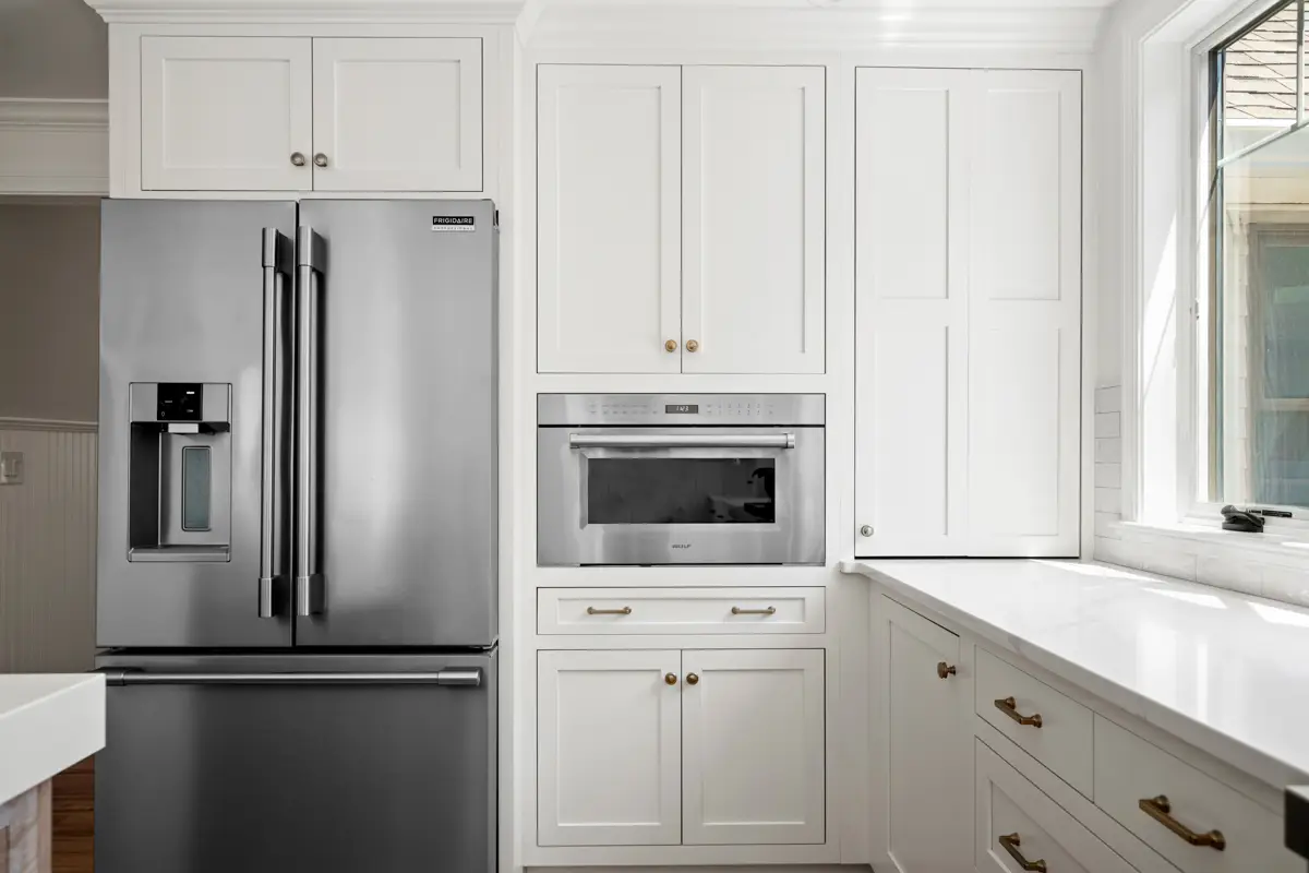 Close-up of custom kitchen cabinets with countertop coordination in a Rowley MA home