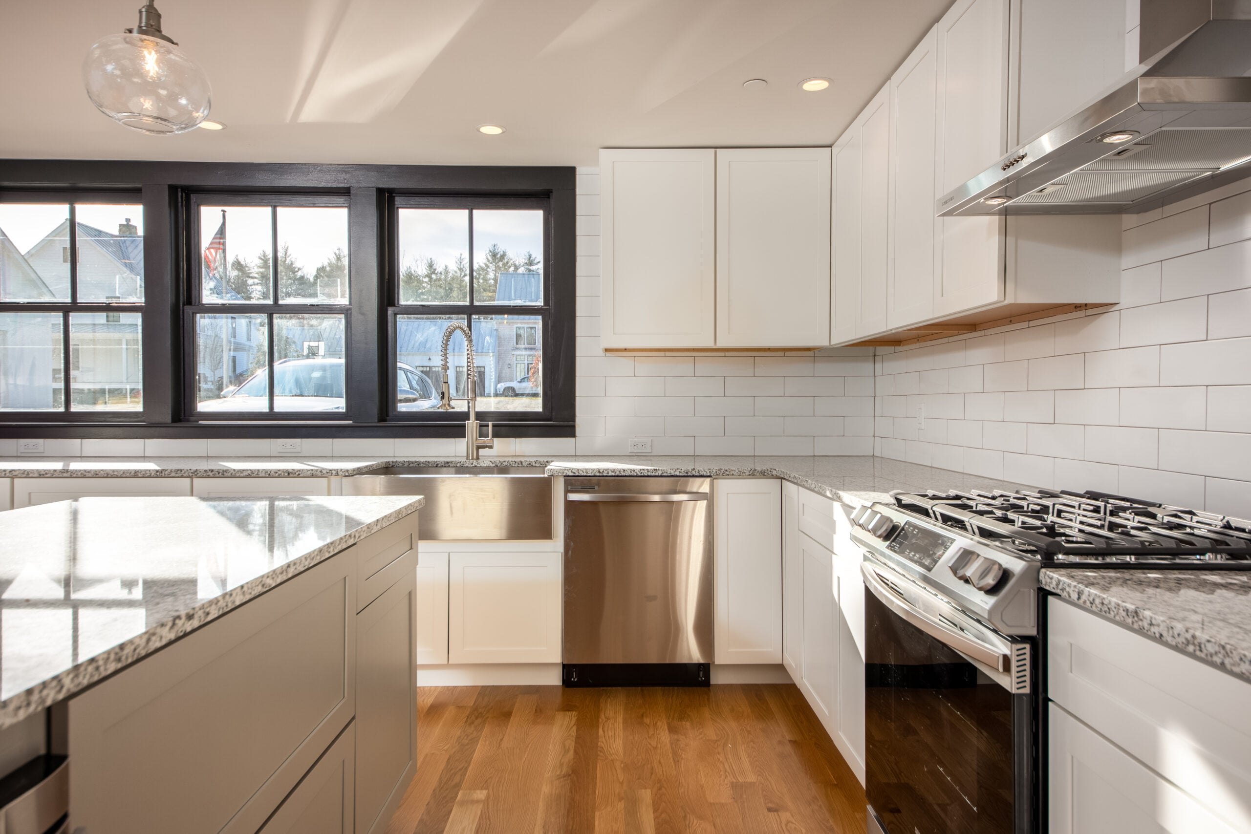 Contemporary kitchen with open shelving and modern cabinetry North Shore MA